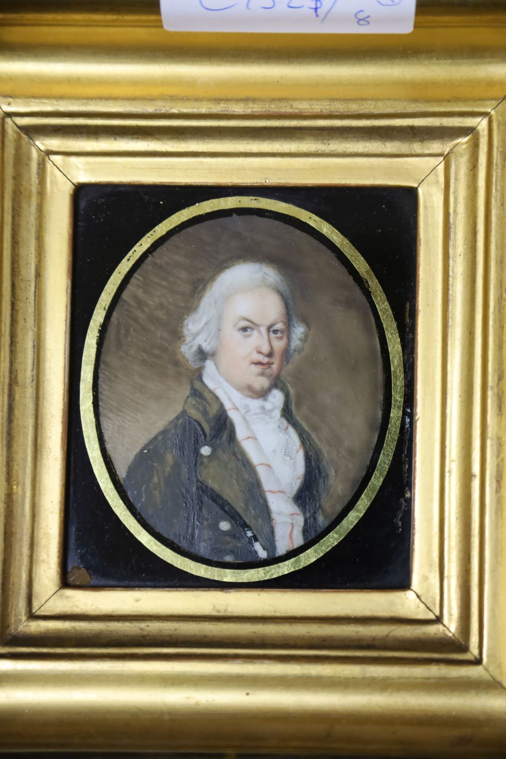 19th century English School, oil on ivory, Portrait miniature of a gentleman, 8 x 6cm and an overpainted print